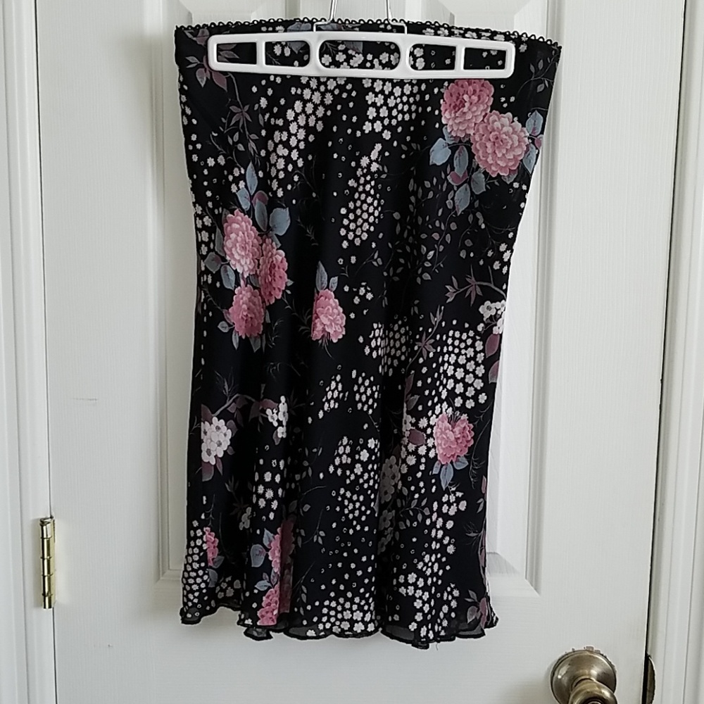 A-line knee length lined skirt with ruffle hem